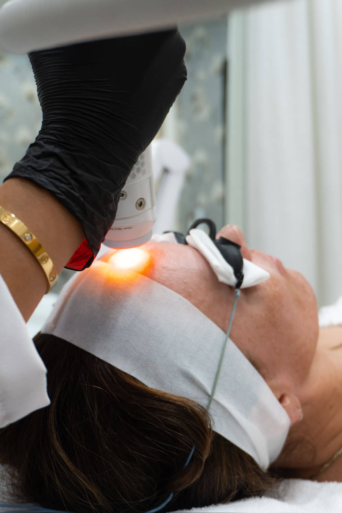 Woman getting a laser treatment