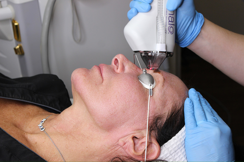 Person getting Halo Treatment done